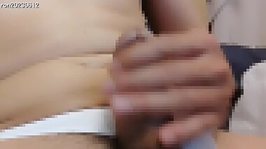 Japanese Masturbating in White Pants.