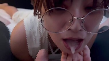Girl with Glasses doing a Blowjob while Making Erotic Sounds and getting a Lot of Sperm